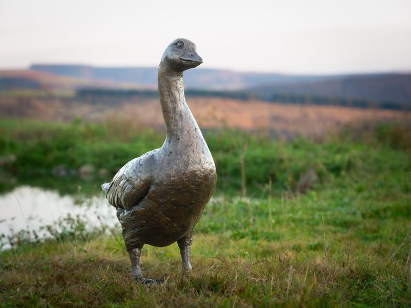 LIFE-SIZED GOOSE TIPPING HEAD SCULPTURE